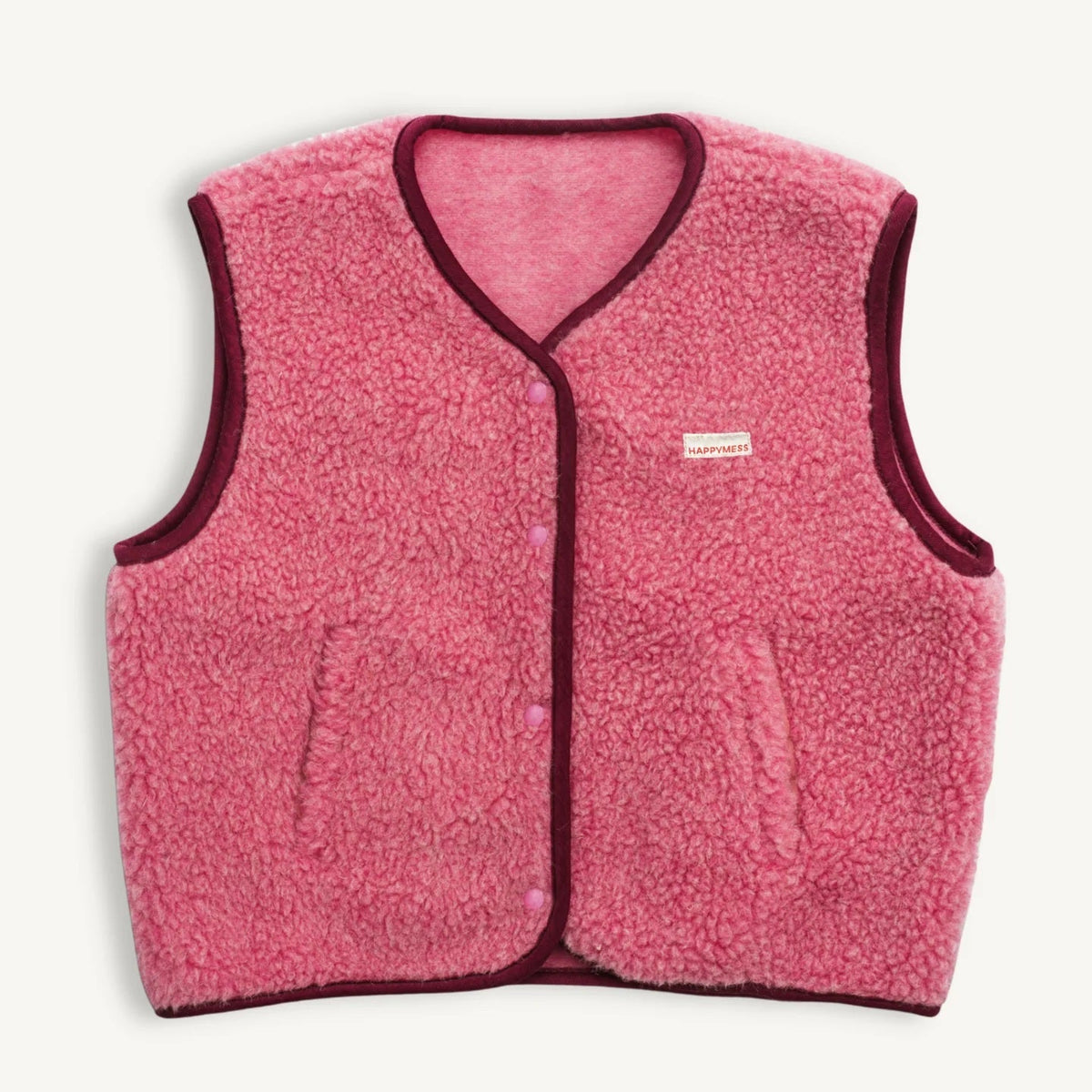 Women's pink merino wool vest by Mewomee, lightweight breathable merino wool vest for everyday wear