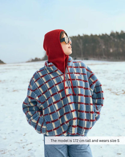 Model wearing a Merino Wool Fleece Jacket in Shadow Blue, featuring a cozy oversized design for winter.