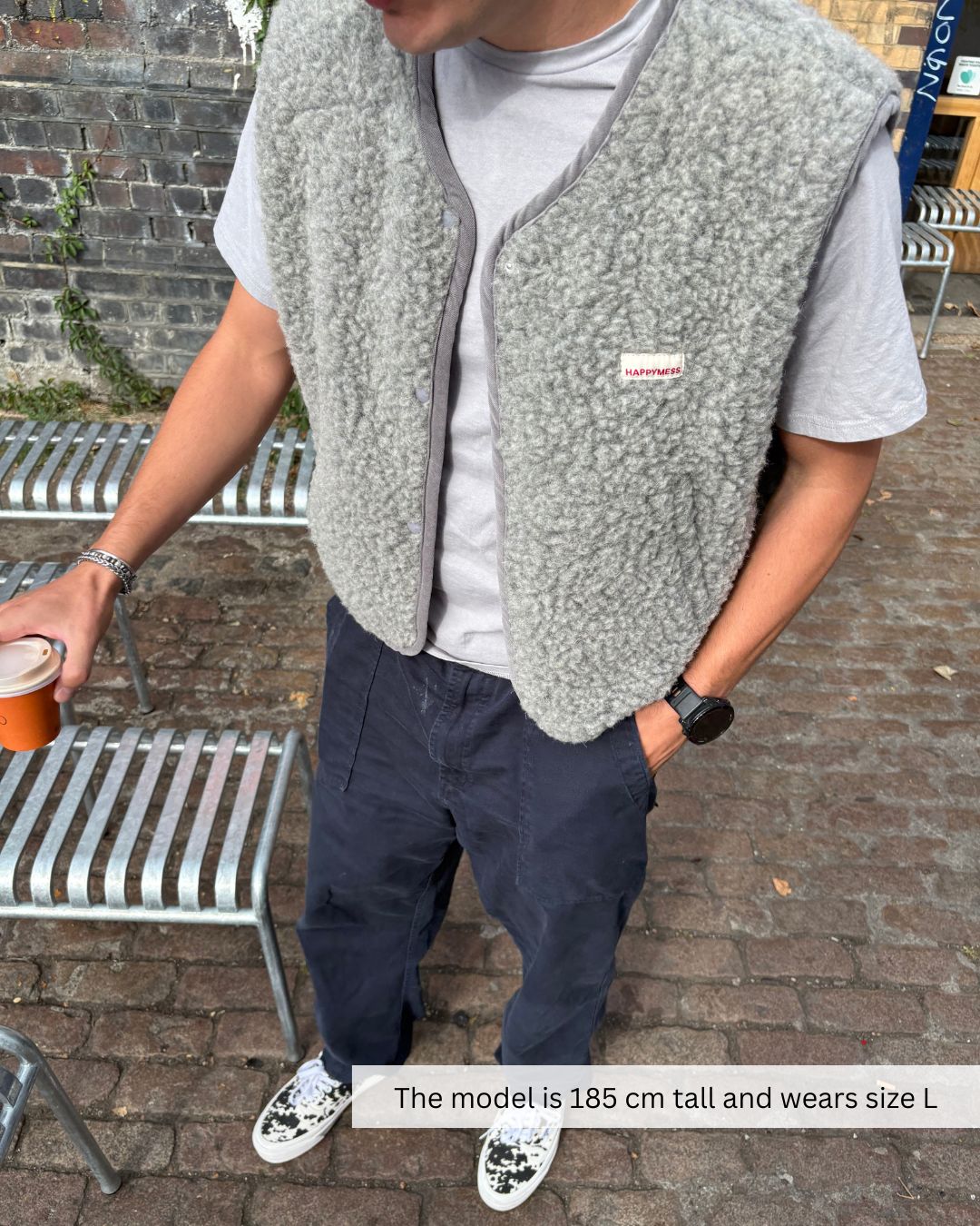 Close-up of outfit with merino wool vest, soft breathable merino wool vest for daily wear