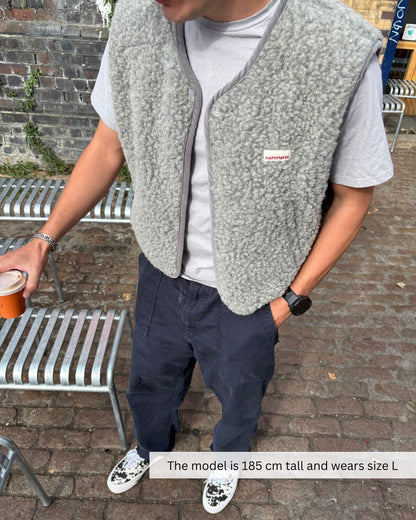 Close-up of outfit with merino wool vest, soft breathable merino wool vest for daily wear