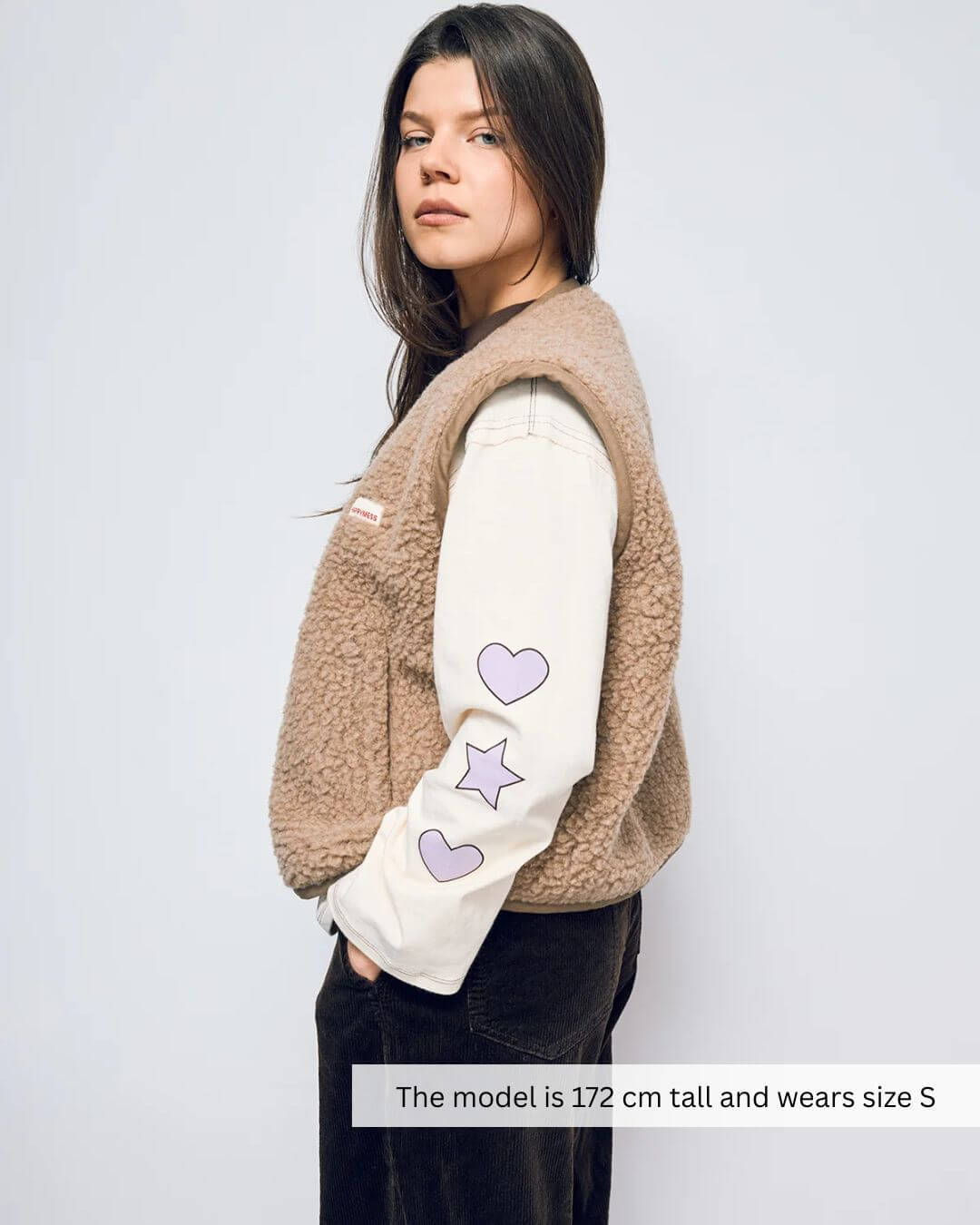 Side view of women's merino wool vest by Mewomee, lightweight European-made merino clothing